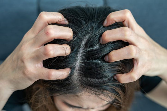 woman itching, scratching scalp, hair health, psoriasis of the scalp